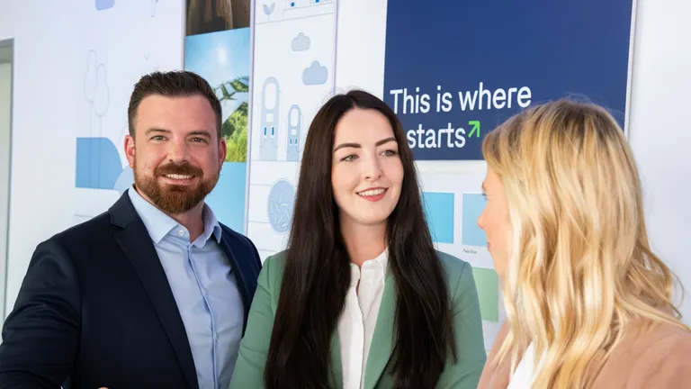 Employees in the OMV office setting.