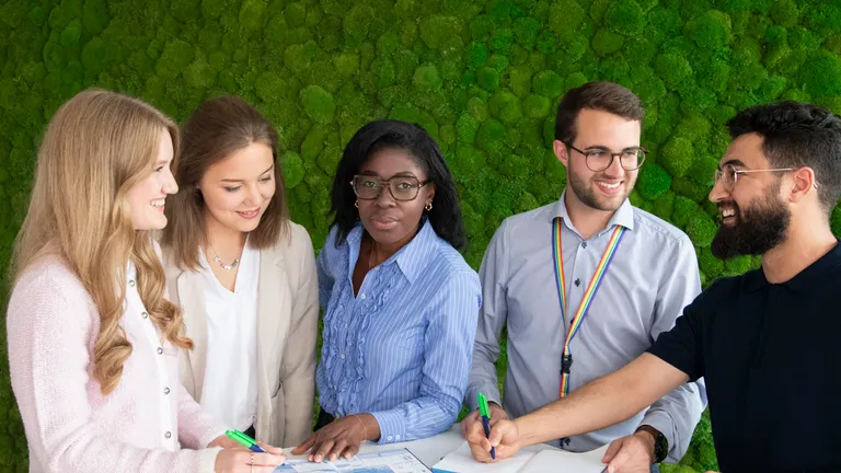 Young people in the office setting.